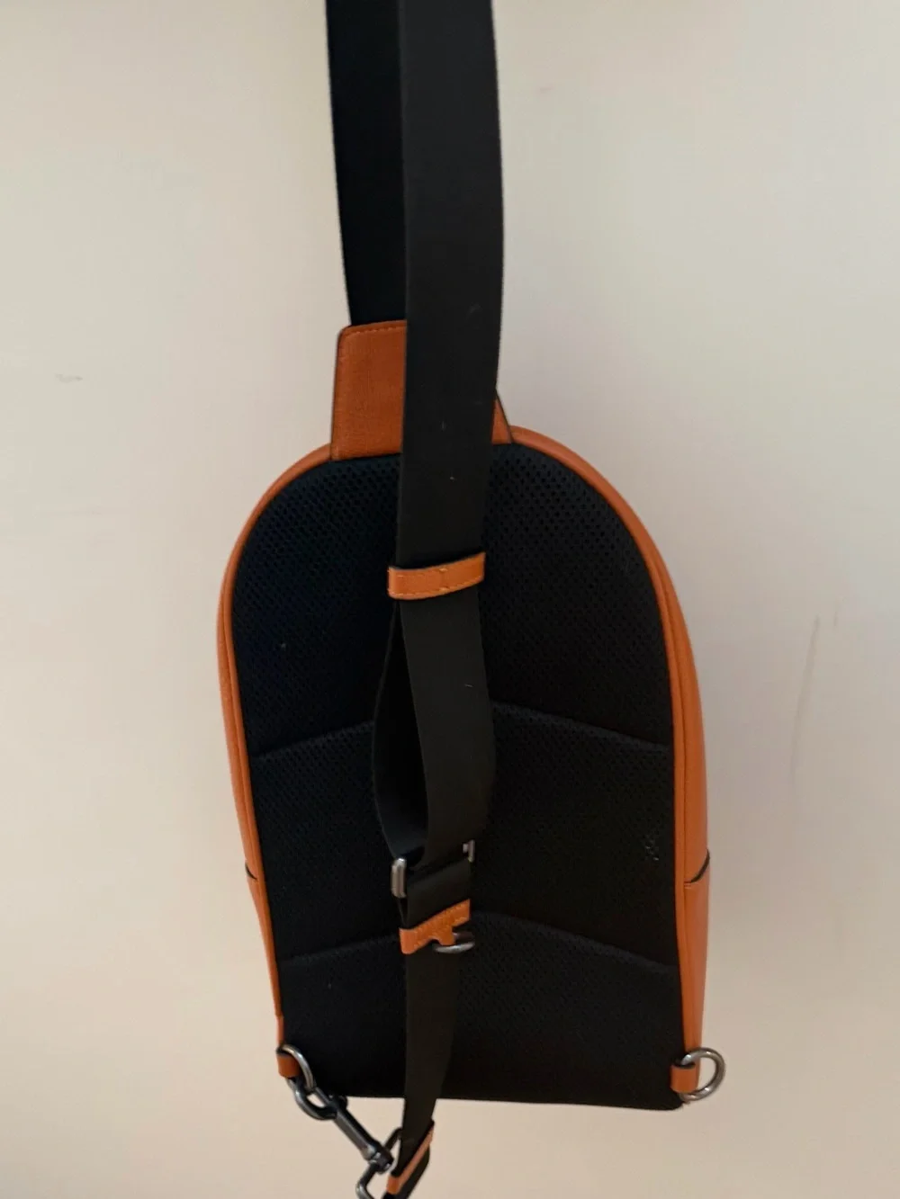 Coach Orange Leather Sling Bag with Black Logo
